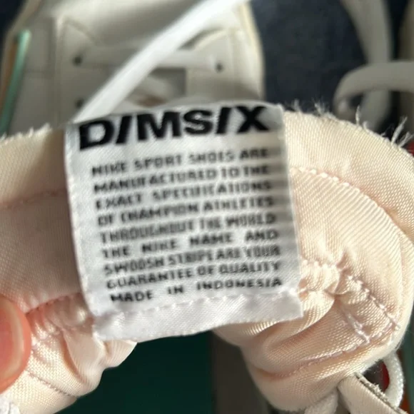 Nike Blazer Mid 77
Infinite Kumquat - orange, blue, red, and white - Picture 9 of 10